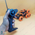 Lateral Dancing Rechargeable Big Size 360 Degree Rotating 8 Wheel Remote Control Stunt Car (Orange), 9 image